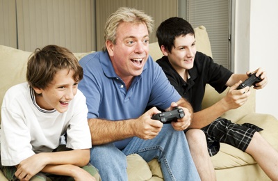 Foster carer dad and boys playing